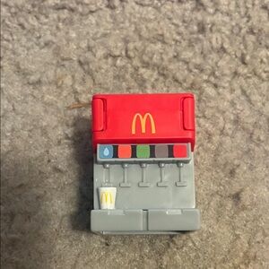 McDonald's Gray Soda Fountain Changeables toy with Red Top and Yellow Logo